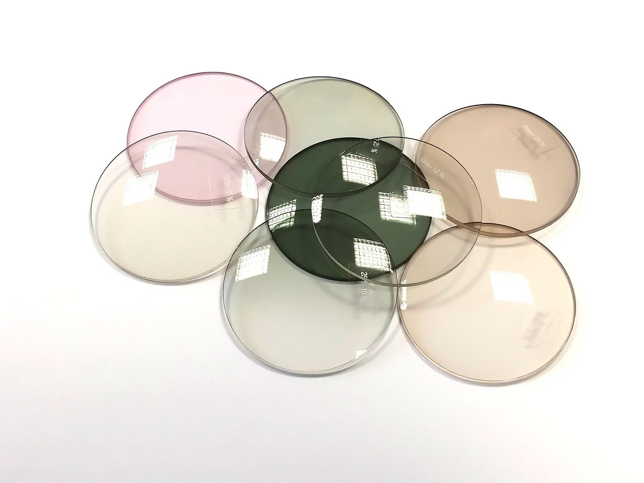 Uncut round spectacle lens blanks in assorted tints